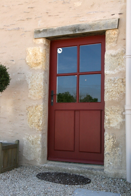 Porte d'entrée cintre surbaissé petits carreaux